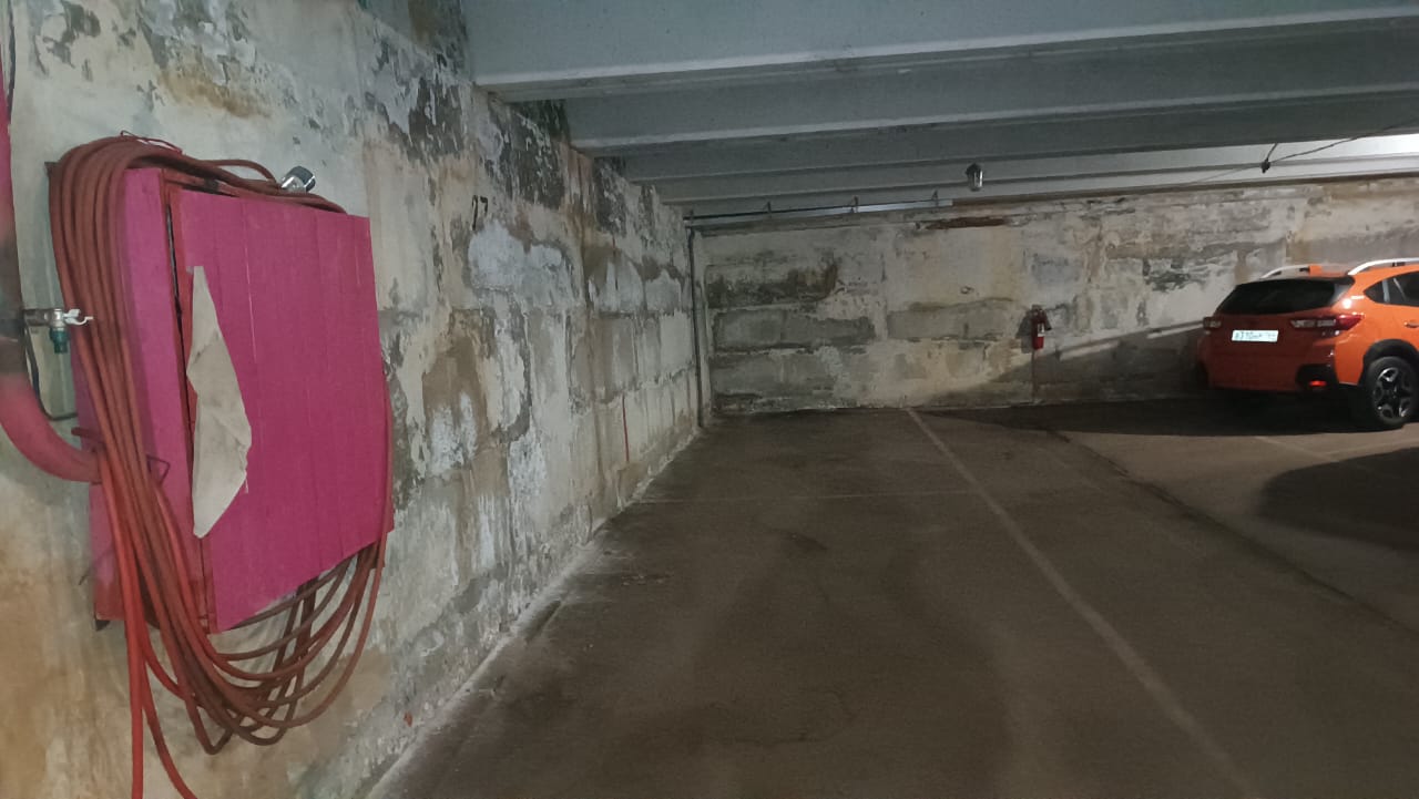 Купить  машиноместо